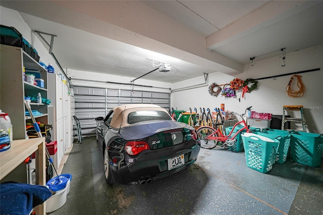 garage featuring a garage door opener