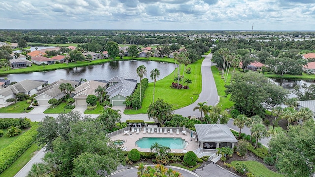 birds eye view of property featuring a water view