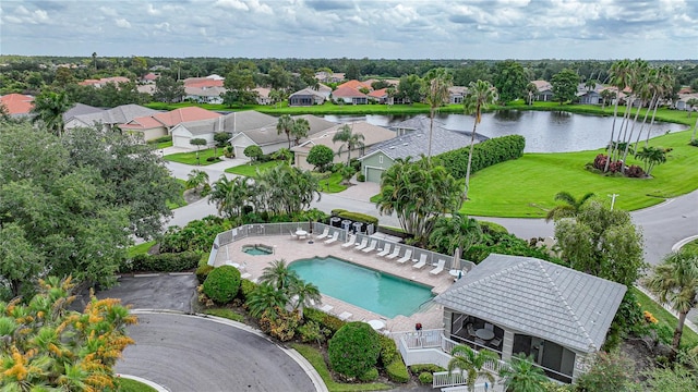 birds eye view of property featuring a water view