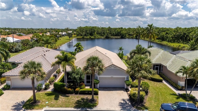 birds eye view of property featuring a water view