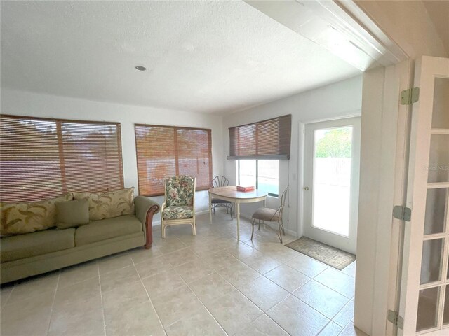 living room with light tile patterned floors