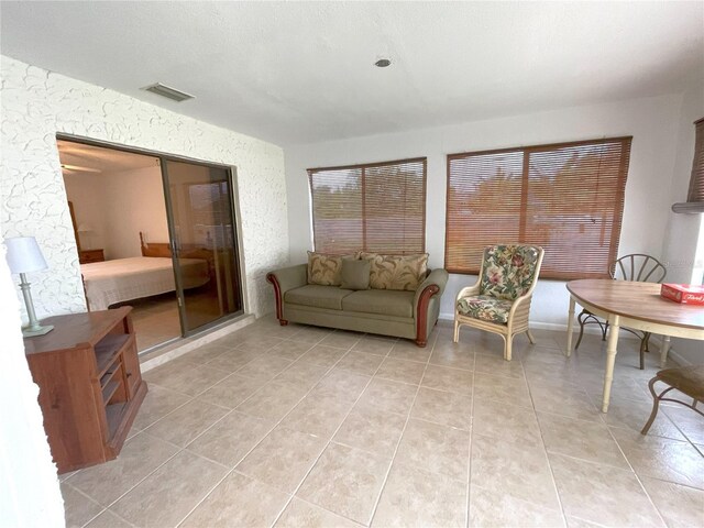 living room featuring light tile patterned floors