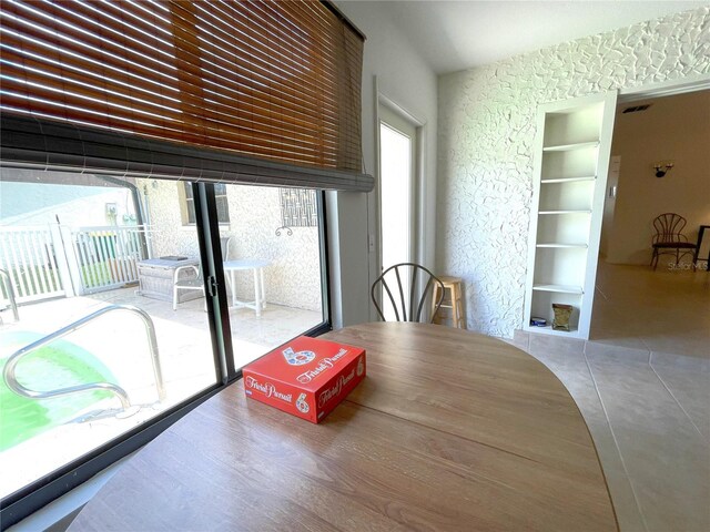 dining area with wood-type flooring