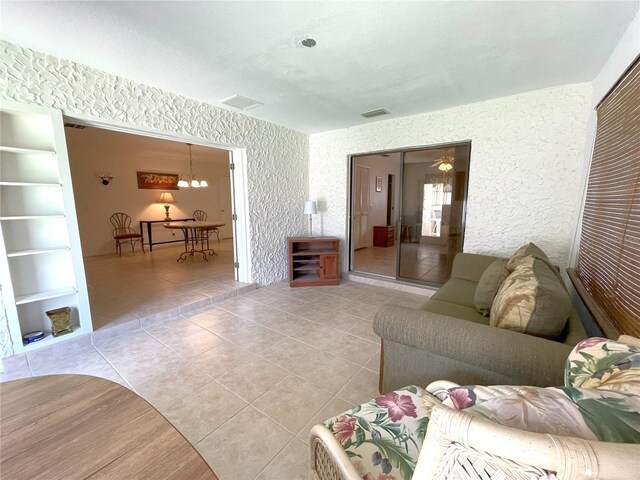 living room with light tile patterned floors