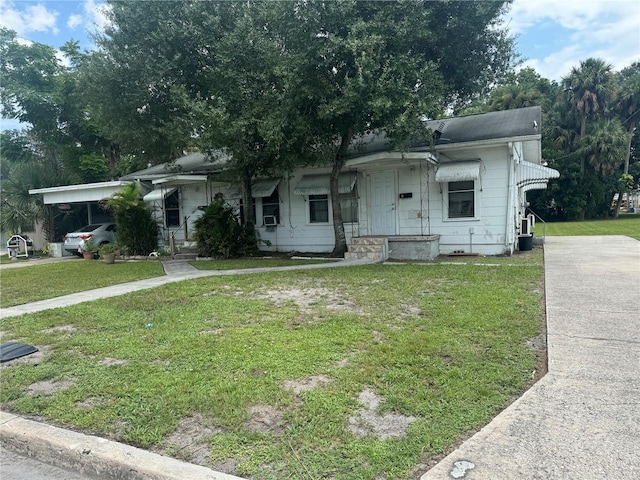 view of front of home featuring a front yard