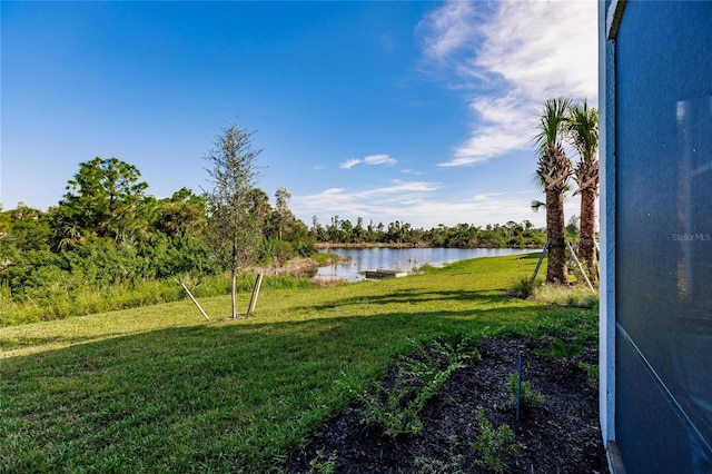 view of yard with a water view