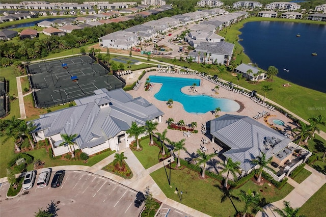 birds eye view of property featuring a water view