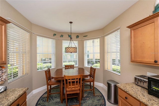 view of tiled dining space