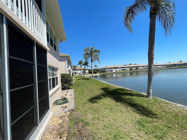 view of yard with a water view