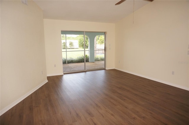 unfurnished room featuring dark hardwood / wood-style floors and ceiling fan