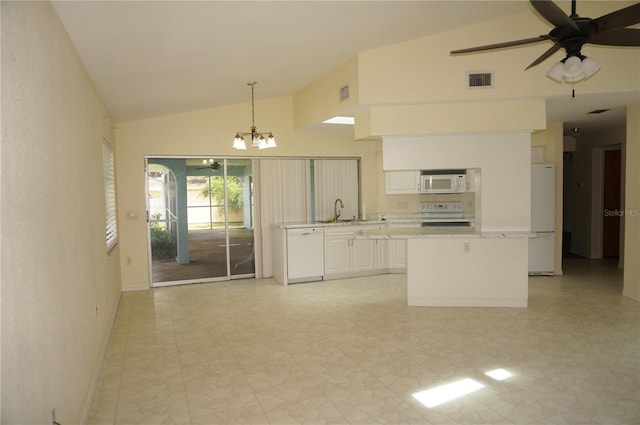 kitchen featuring sink, white appliances, ceiling fan with notable chandelier, light tile patterned floors, and white cabinets