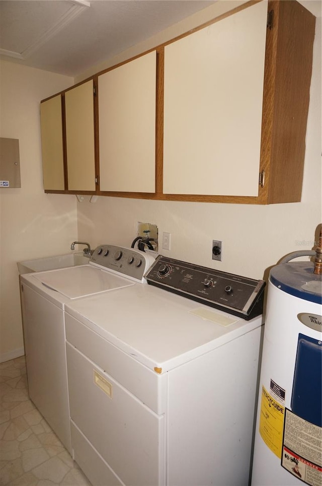 clothes washing area with washer and dryer, cabinets, electric water heater, sink, and light tile patterned flooring