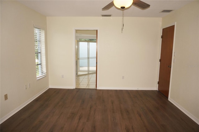 unfurnished room featuring ceiling fan and hardwood / wood-style flooring