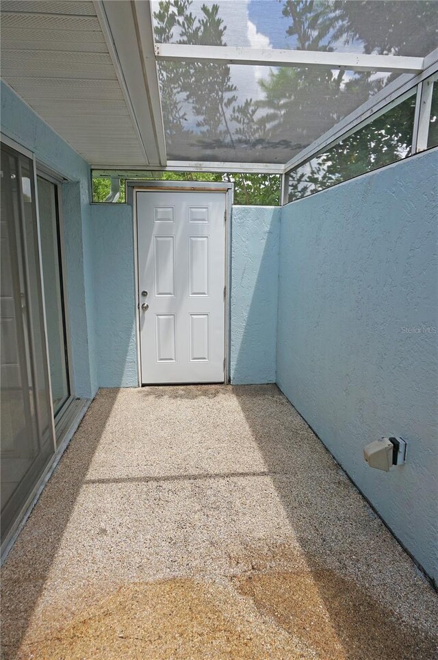 unfurnished sunroom featuring a healthy amount of sunlight