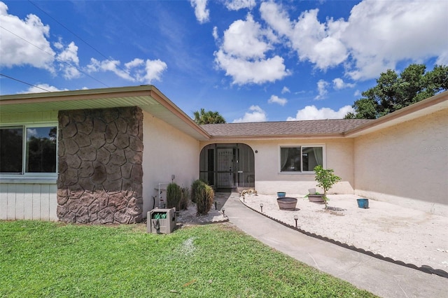 view of front of home with a front yard