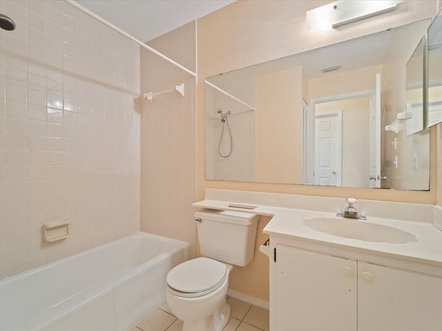 full bathroom featuring tiled shower / bath combo, toilet, tile patterned flooring, and vanity