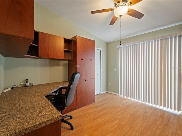 office with ceiling fan, light hardwood / wood-style flooring, and lofted ceiling