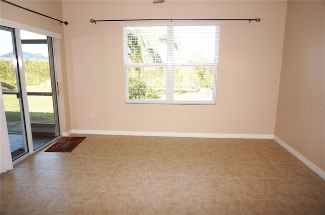 view of tiled spare room