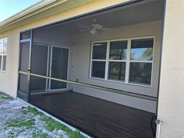 wooden deck with ceiling fan