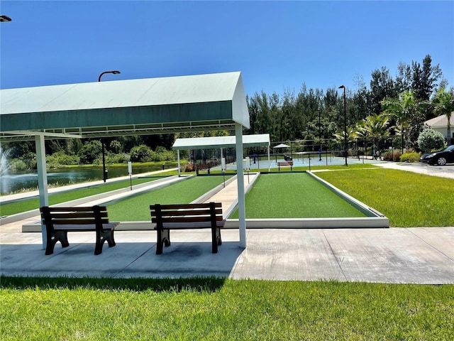 view of property's community with a water view