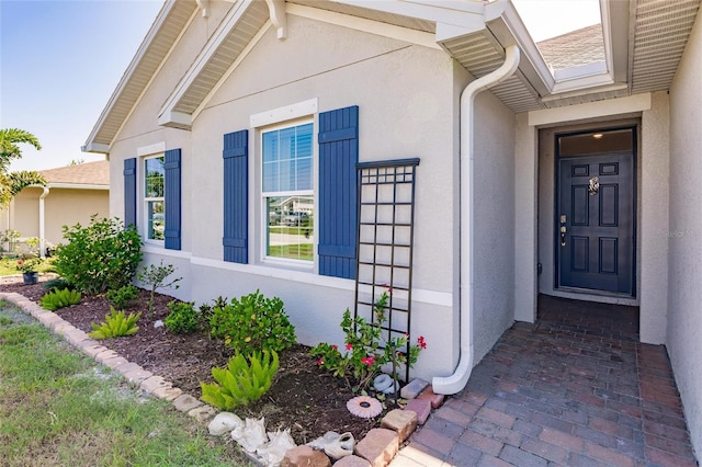 27261 Guapore Dr, Punta Gorda, FL 33983 - entrance to property featuring stucco siding