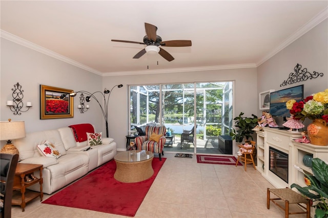 living room featuring ceiling fan, light tile patterned floors, and crown molding