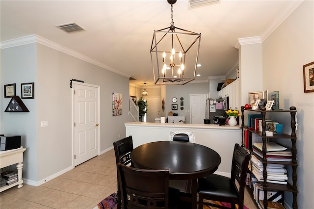 dining area featuring a notable chandelier, crown molding, and light tile patterned flooring