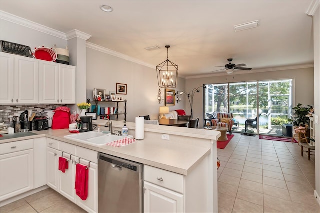 kitchen featuring sink, ceiling fan with notable chandelier, tasteful backsplash, dishwasher, and kitchen peninsula