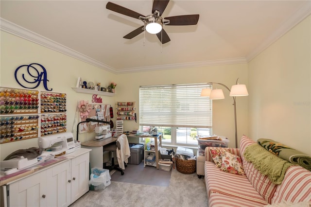 office featuring ceiling fan, light carpet, and crown molding