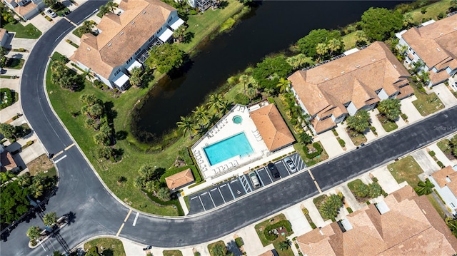 birds eye view of property featuring a water view