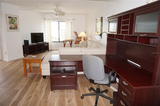 office area with ceiling fan and light wood-type flooring