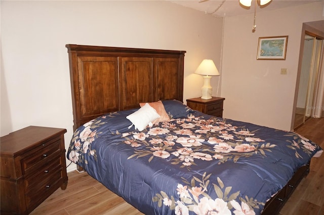 bedroom with ceiling fan and light wood-type flooring