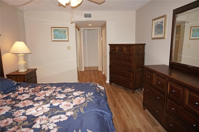 bedroom featuring ceiling fan and light hardwood / wood-style floors