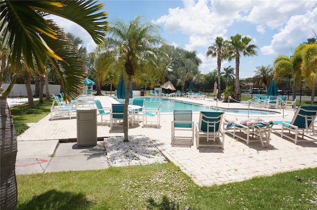 view of pool featuring a patio