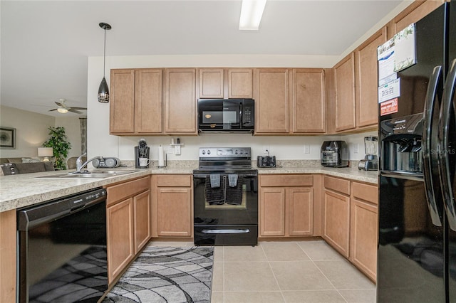 kitchen with sink, light tile patterned floors, decorative light fixtures, ceiling fan, and black appliances