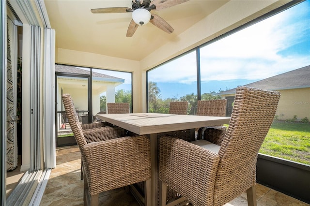 sunroom / solarium with ceiling fan