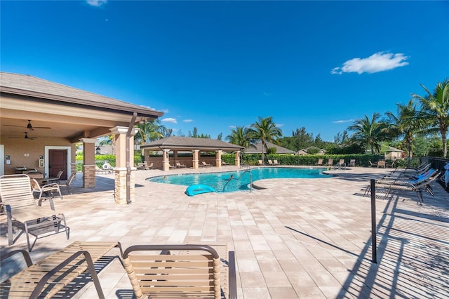 view of swimming pool with a gazebo and a patio