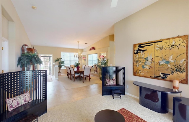 living room with vaulted ceiling, an inviting chandelier, and light tile patterned floors