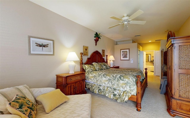 bedroom with ceiling fan, a closet, and light carpet