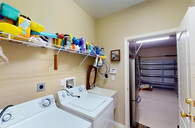 laundry room with washing machine and dryer