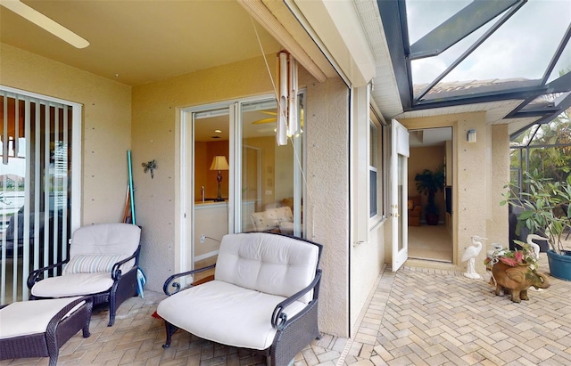 view of patio with a lanai