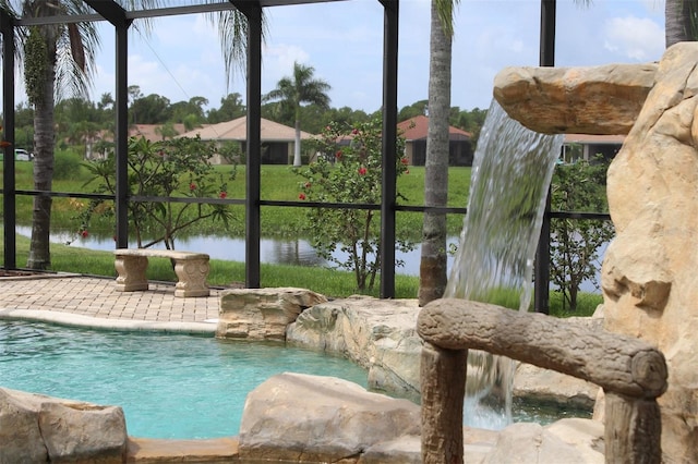 view of swimming pool featuring a patio area and pool water feature