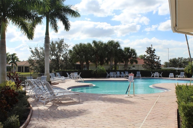 view of swimming pool featuring a patio area