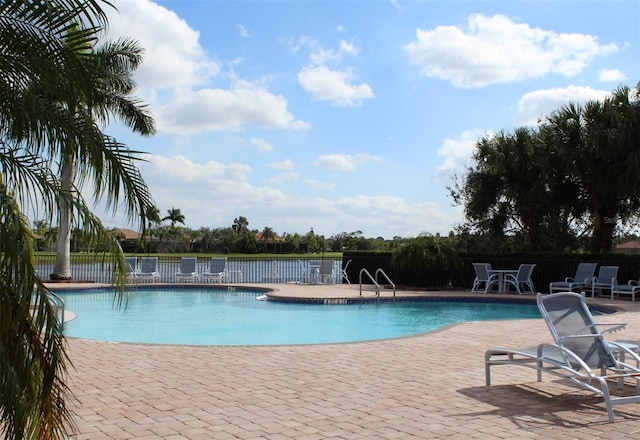 view of swimming pool featuring a patio