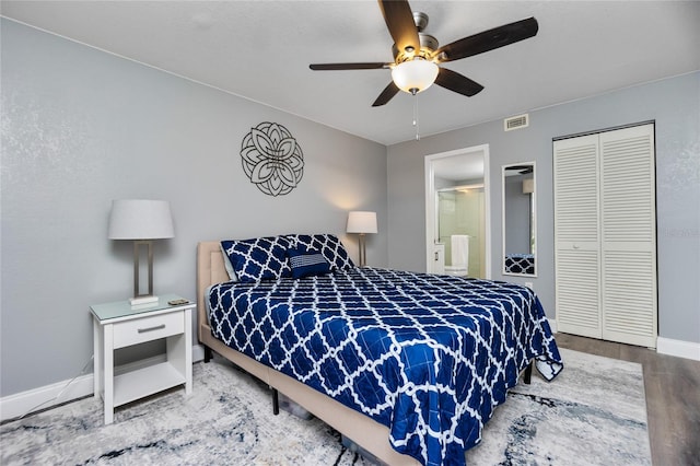 bedroom featuring a closet, ceiling fan, and hardwood / wood-style floors