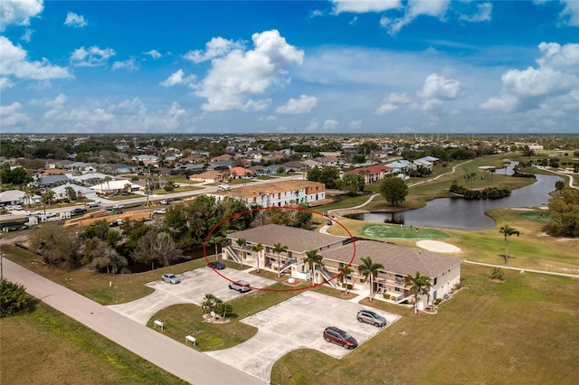 bird's eye view with a water view