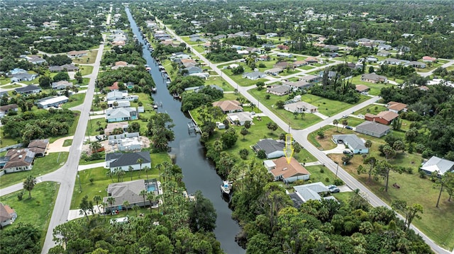 aerial view featuring a residential view and a water view