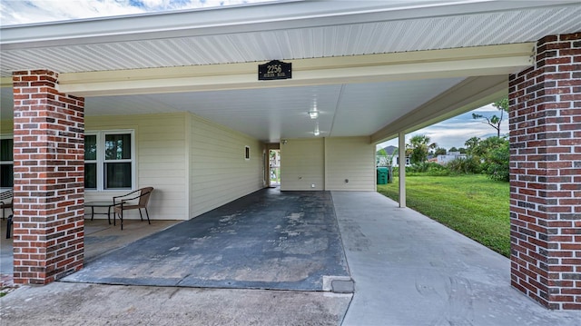 view of patio / terrace with a carport