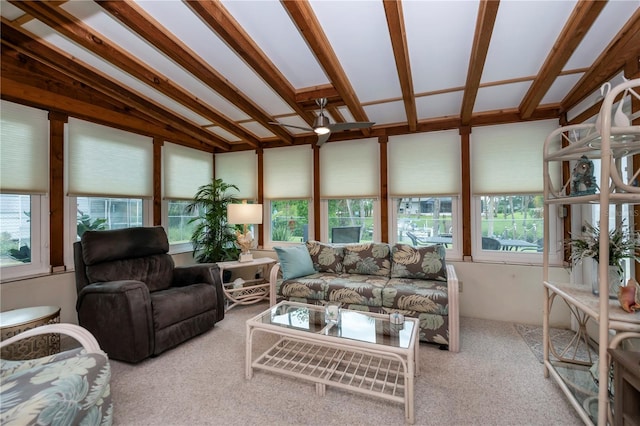 sunroom / solarium featuring ceiling fan