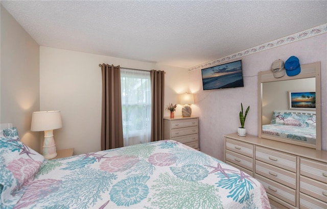 bedroom with a textured ceiling